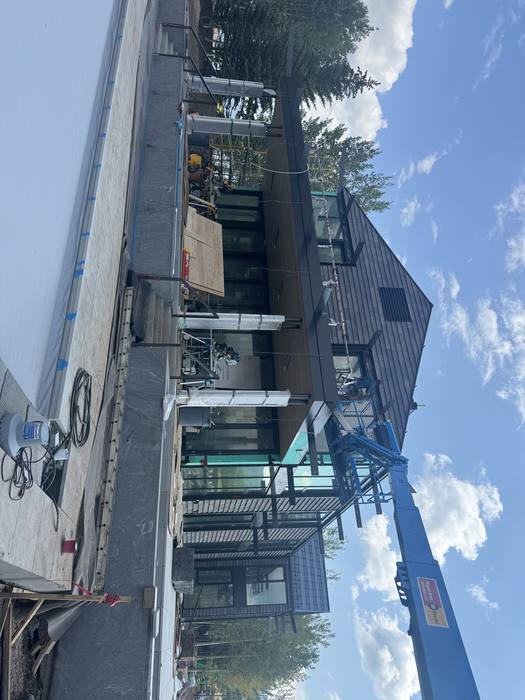 Steel window mullions integrated with exterior cladding.