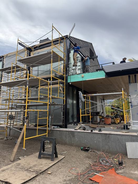 Structural steel beams and columns framing a large opening.