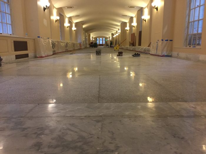 Gloss returning to the terrazzo as the floor comes up through the finer grits.